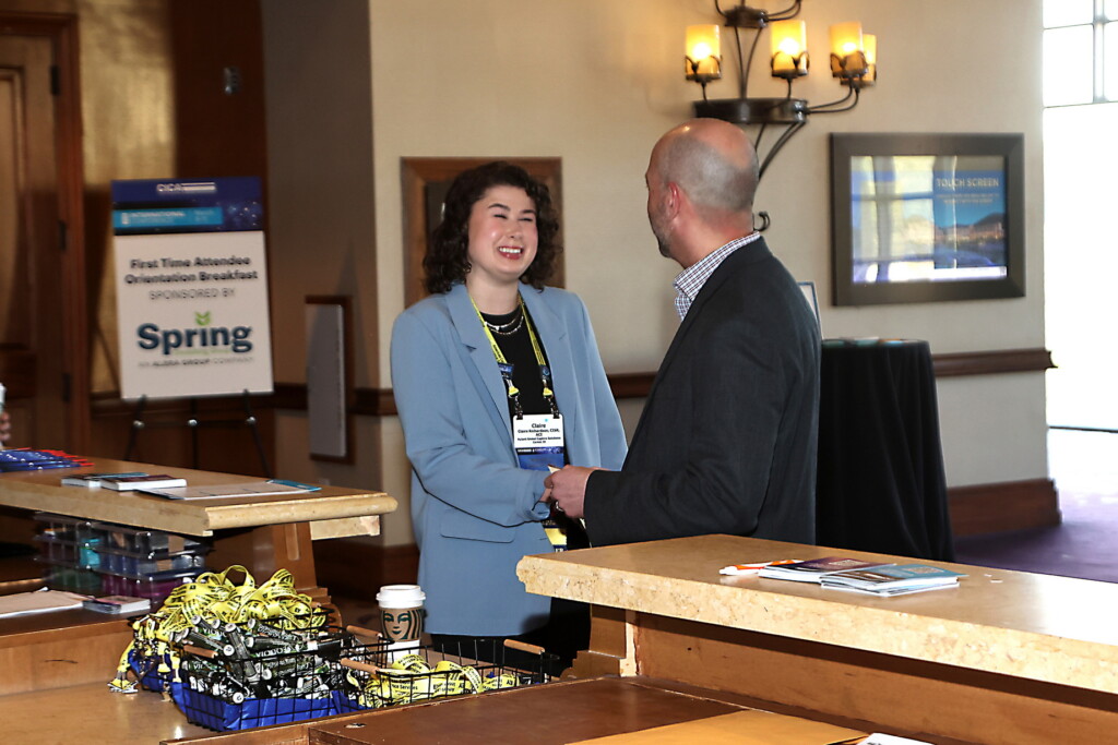 Attendees at the registration desk at the CICA 2025 International Conference