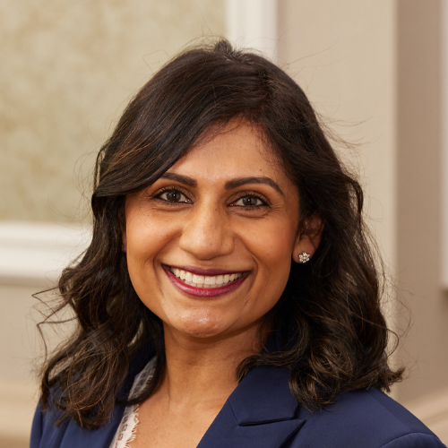 Head shot photo of Julie Patel smiling